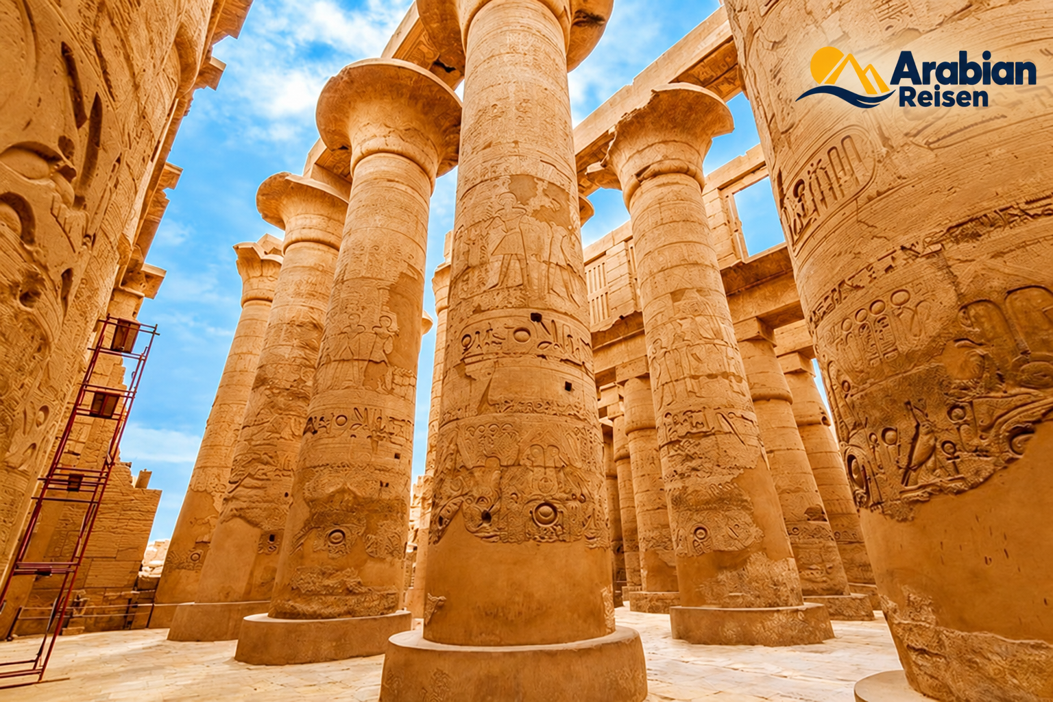 Ancient columns at Karnak Temple in Luxor with the Arabian Reisen logo